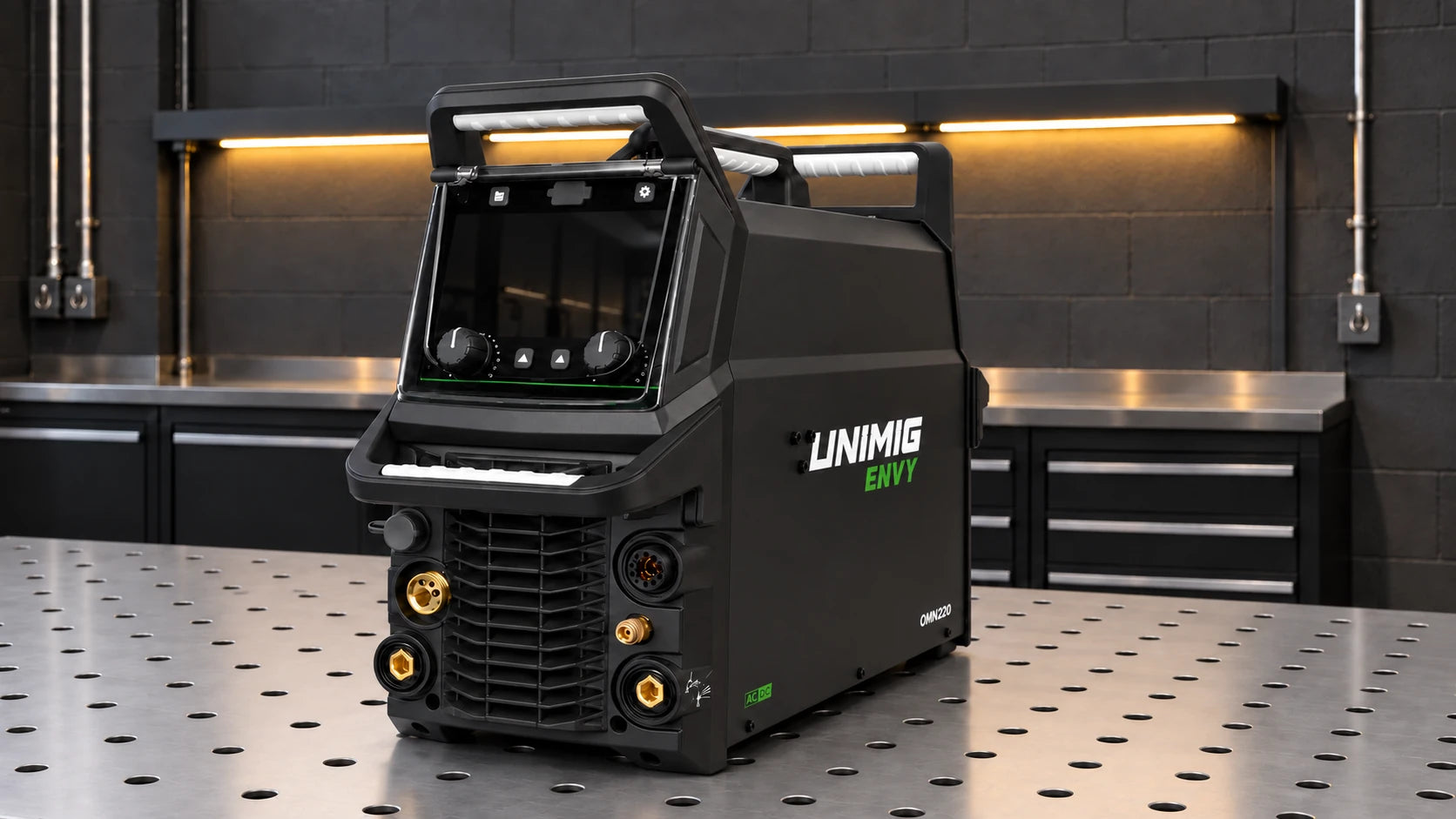 UNIMIG ENVY OMNI 220 welder on a workshop bench