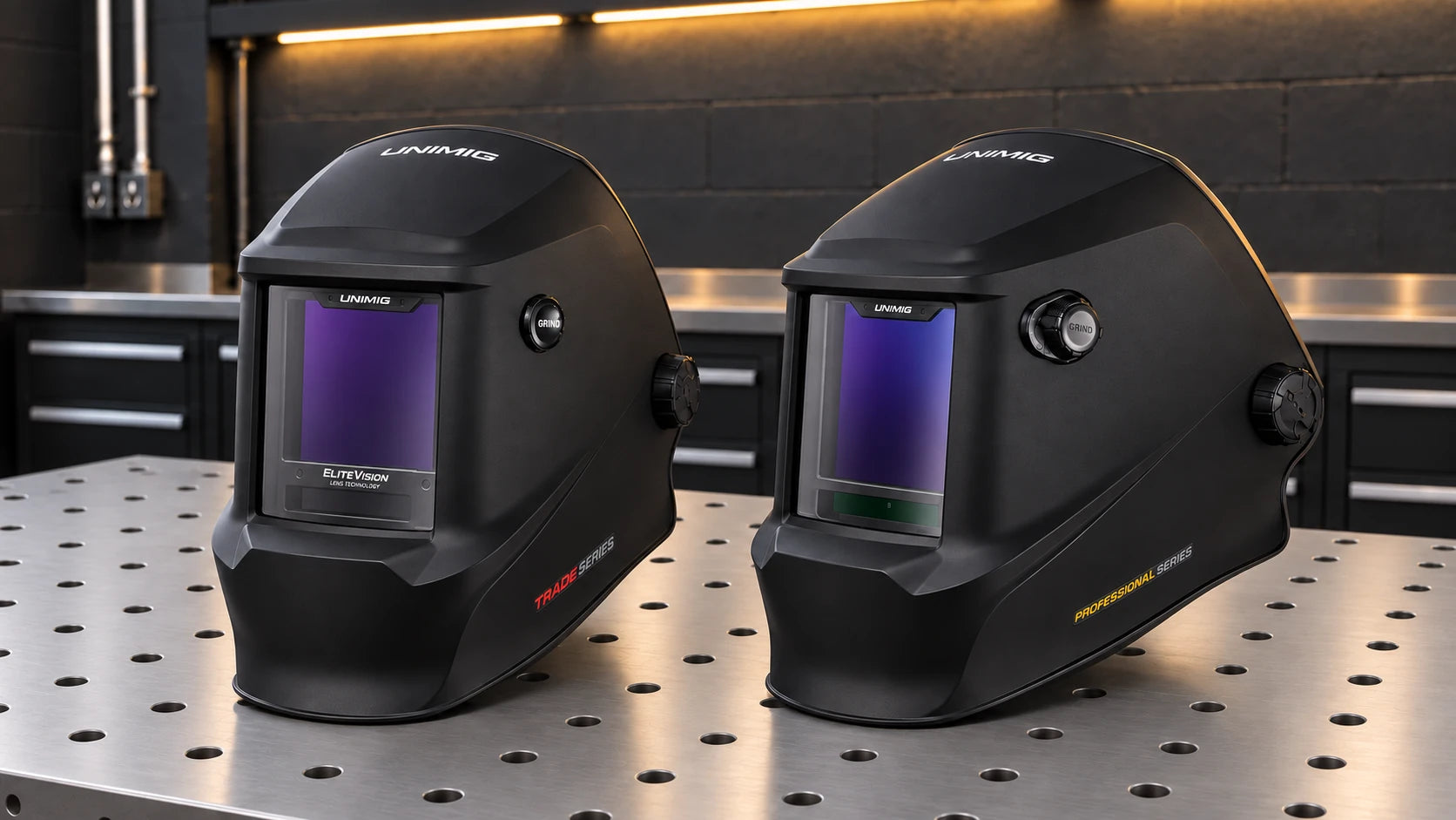 Black UNIMIG Trade and Professional welding helmets displayed side by side