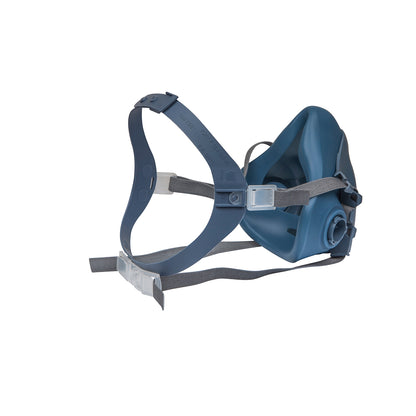 3M 7502 medium reusable half-face respirator, opposite rear three-quarter view showing inner seal and harness adjustment; filters not fitted