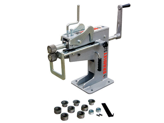 Bramley SJ2 manual swage, jenny and wiring machine with its supplied roller attachments, collars and bearing blocks arranged beside it.