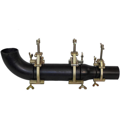 Sumner DX clamp application example showing three clamps aligning an elbow, straight pipe and reducer; clamps sold individually by size.