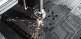 UNIMIG Stealth 3000 CNC table torch mount and sighting laser during plasma cutting; torch and steel shown in use