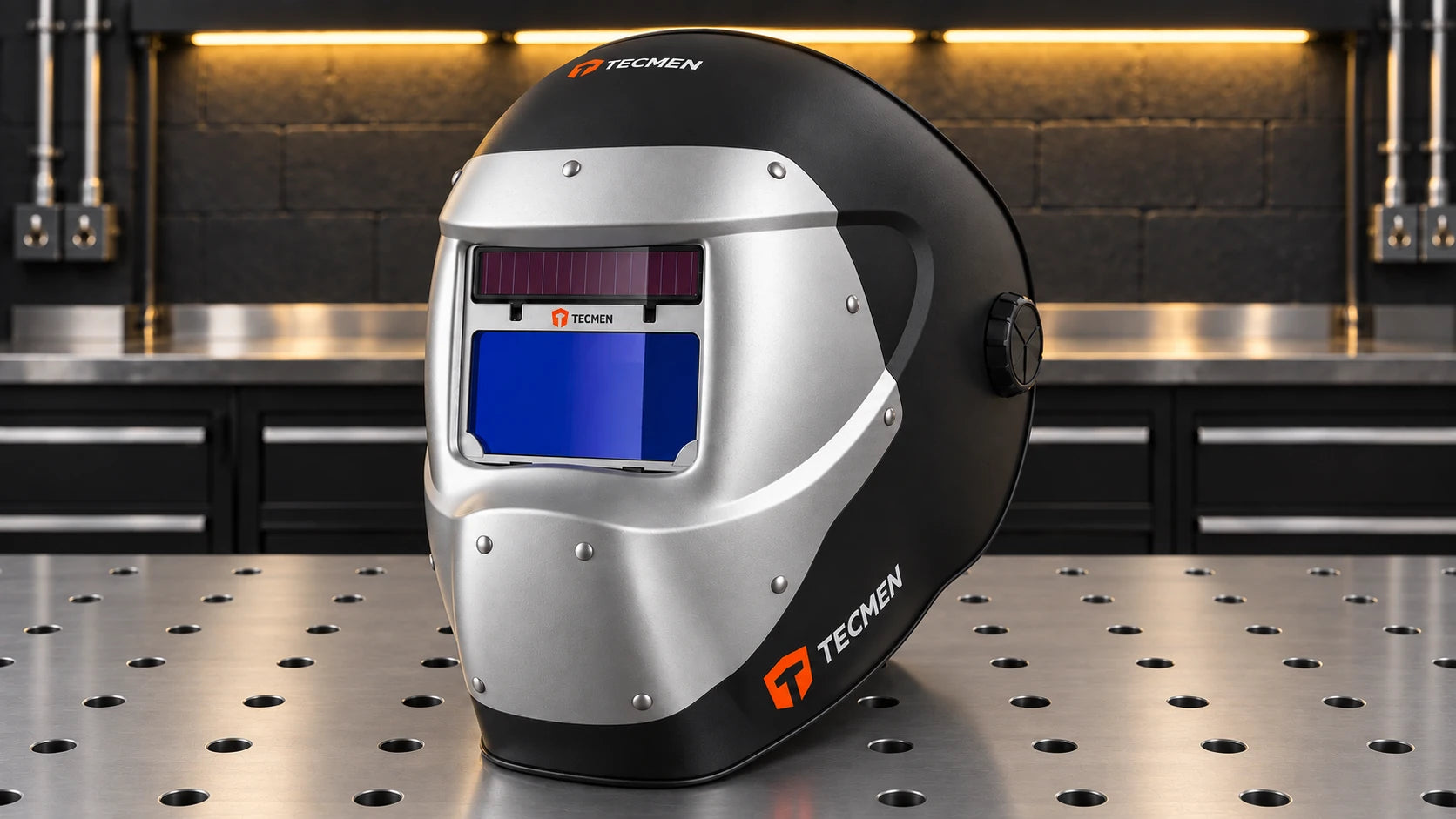 TECMEN 100LW laser welding helmet on a workshop bench