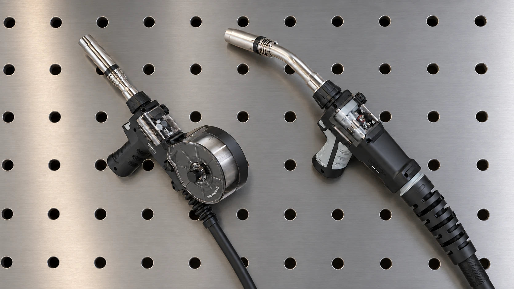 Spool gun and push-pull welding gun displayed for comparison